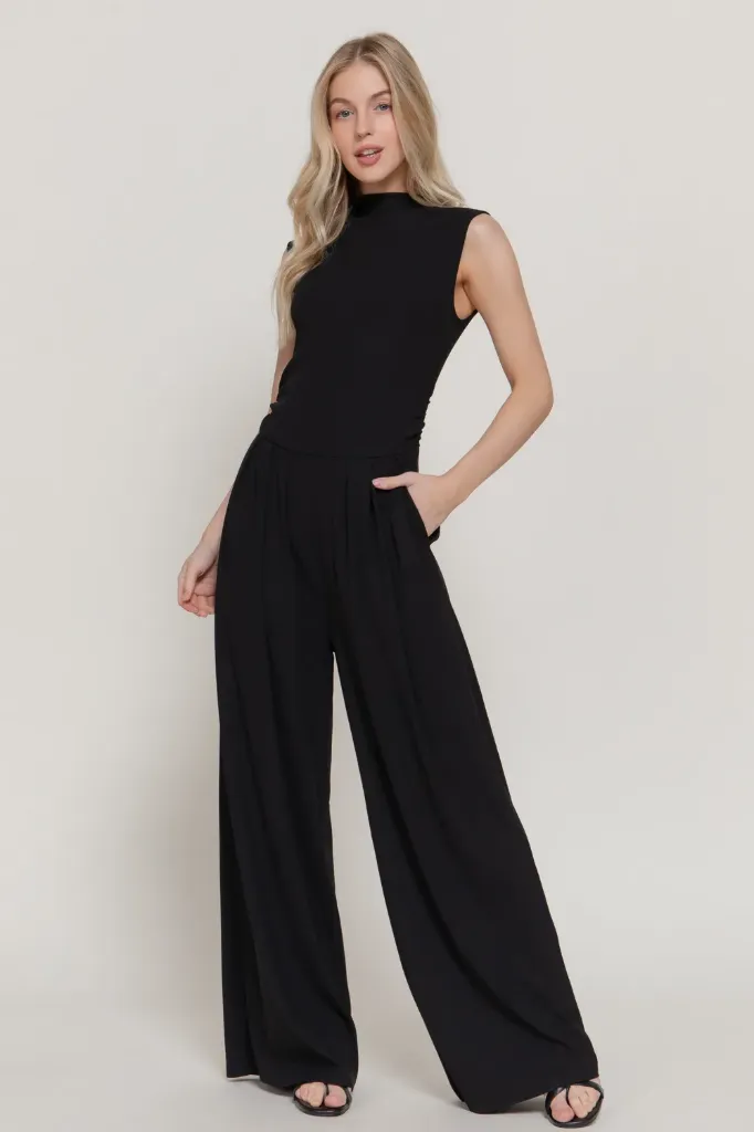 P15292 SLEEVELESS HIGH NECK PLEATED RIB JUMPSUIT (Black, S)